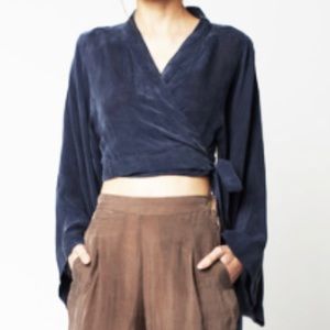 Crossover crop top with exaggerated sleeves